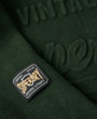 Kohokuvioitu Vintage Logo -huppari (green)