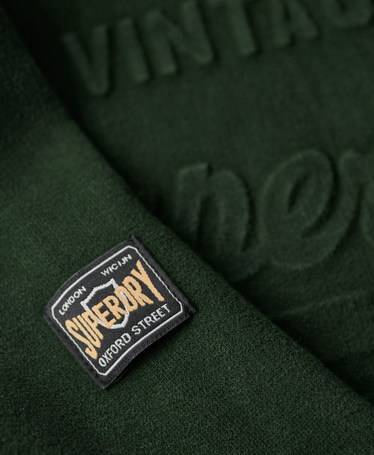 Kohokuvioitu Vintage Logo -huppari (green)